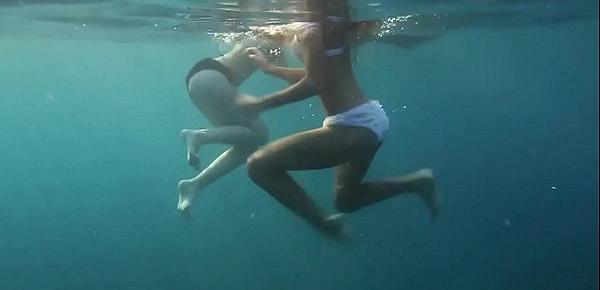  Naked girls on Tenerife having fun in the water
